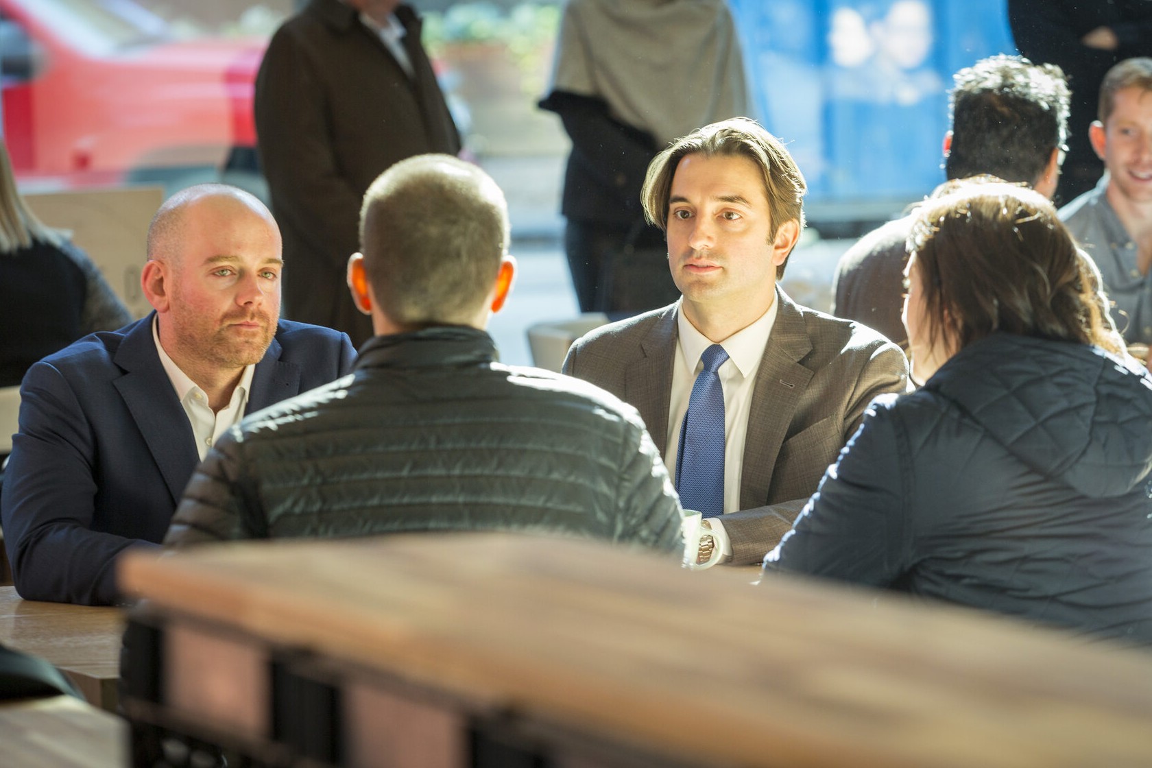 Spivak & Sakellariou attorneys meeting with a client about a road injury